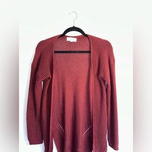 Women’s small Burgundy knitted sweater.